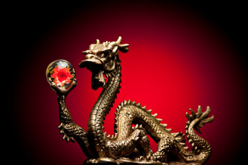Chinese Dragon holding a Chrysanthemum Sphere