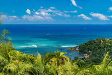 Scenic landscape view from top of fond ferdinand nature reserve in Praslin on a turquoise sea....