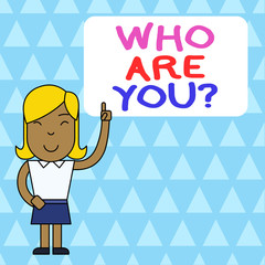 Word writing text Who Are You Question. Business photo showcasing asking about someone identity or demonstratingal information Woman Standing with Raised Left Index Finger Pointing at Blank Text Box
