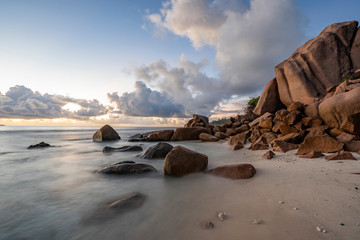 Fototapeta na wymiar amazing tropical landscape view during sunrise on the paradise beaches of Seychelles on la digue, travel, luxury holiday concept