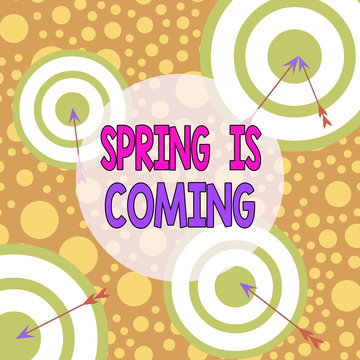 Text sign showing Spring Is Coming. Business photo text After winter season is approaching Enjoy nature flowers sun Arrow and round target inside asymmetrical shaped object multicolour design