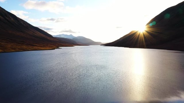 aerial footage of glen etive and loch etive in the argyll region of the highlands of scotland near glencoe and fort william on a golden autumn day near sunset 