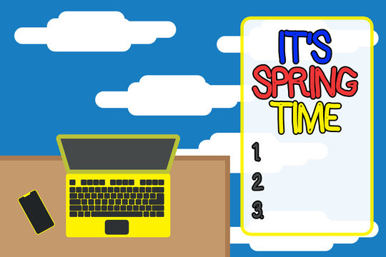 Word writing text It S Spring Time. Business photo showcasing Season After Winter Bloosoming of Flowers Transformation Upper view office working place laptop lying wooden desk smartphone side