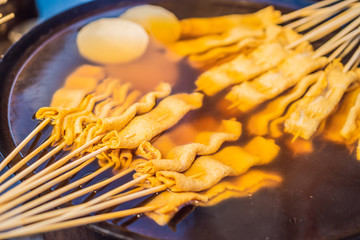 Typical Korean street food on a walking street of Seoul. Spicy fast food simply found at local Korean martket, Soul Korea