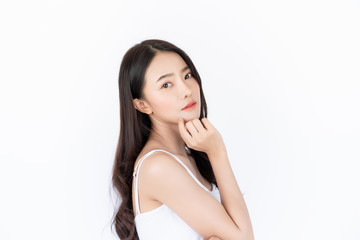 Young asian woman has smiling face and bright skin tone.Asian woman standing with isolated white background.