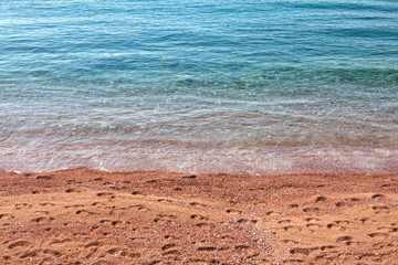 transparent sea water and sandy sea