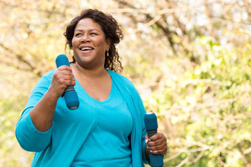 Beautiful mature African American woman smiling and laughing.