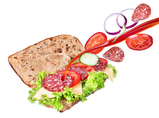 sandwich with flying ingredients