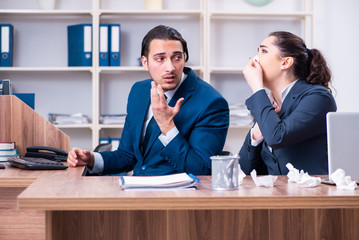 Two employees suffering at workplace