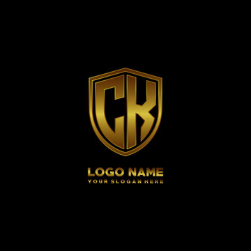 Initial letters CK shield shape gold monogram logo. Shield Secure Safe logo design inspiration
