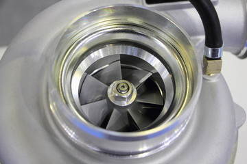 New car turbo charger with impeller close up, motor tuning