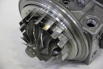 Close up propeller blades on new car engine turbine, cold part