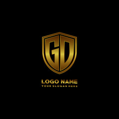 Initial letters GD shield shape gold monogram logo. Shield Secure Safe logo design inspiration
