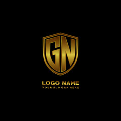 Initial letters GN shield shape gold monogram logo. Shield Secure Safe logo design inspiration