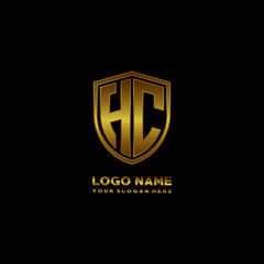 Initial letters HC shield shape gold monogram logo. Shield Secure Safe logo design inspiration