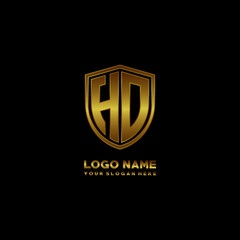 Initial letters HD shield shape gold monogram logo. Shield Secure Safe logo design inspiration