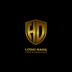 Initial letters HO shield shape gold monogram logo. Shield Secure Safe logo design inspiration