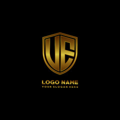 Initial letters UE VE shield shape gold monogram logo. Shield Secure Safe logo design inspiration
