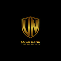 Initial letters UN VN shield shape gold monogram logo. Shield Secure Safe logo design inspiration