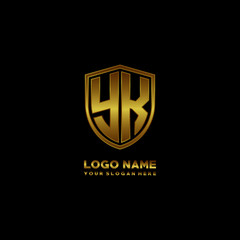 Initial letters YK shield shape gold monogram logo. Shield Secure Safe logo design inspiration
