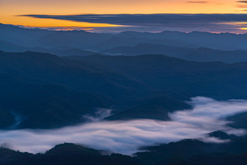 Landscape of misty mountains at the sunrise in Nan province, Doi Samer Dao, North of Thailand