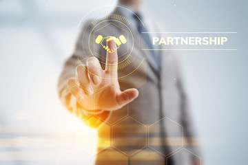 Partnership Business Finance concept on screen. Businessman pressing button.