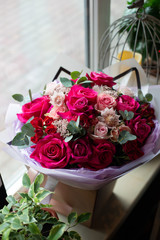 bouquet of flowers. Bouquet of natural fresh roses, tulips, anemones, peonies, ranunculi, matthiola, daffodil, cloves, eucalyptus. A bouquet of flowers is decorated in a composition of flowers 