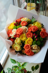 bouquet of flowers. Bouquet of natural fresh roses, tulips, anemones, peonies, ranunculi, matthiola, daffodil, cloves, eucalyptus. A bouquet of flowers is decorated in a composition of flowers 