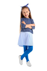 Fashionable little girl in autumn clothes on white background