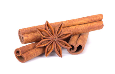 Spicy Cinnamon Sticks and Anise isolated on White background closeup macro shot