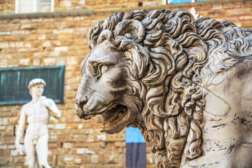Antique sculpture -  head of  ferocious lion