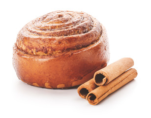 Tasty cinnamon bun on white background