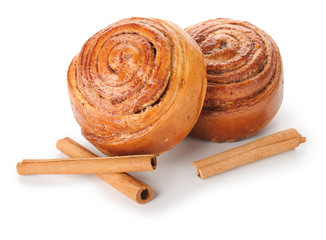 Tasty cinnamon buns on white background