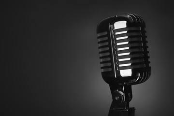 Retro microphone on dark background