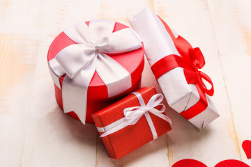 Gift boxes for Valentine's Day on wooden background