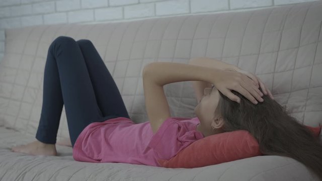 Excited teen in the bed.