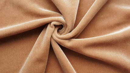 velvet texture beige color background, expensive luxury fabric,  wallpaper. copy space