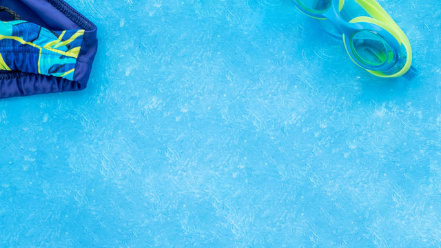 Swimming pool sport crawl swimmer flat lay banner. accessories for in water pool lane training for competition. Healthy active lifestyle banner 3x8