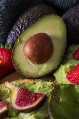 natural avocado with fruit and guacamole toast