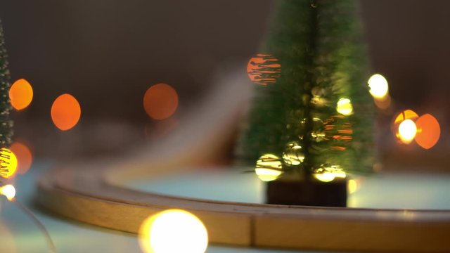 Santa christmas toy train , christmas tree and bokeh. holiday background
