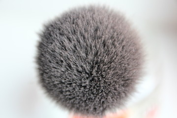 cosmetic brush for applying powder on the face close up
