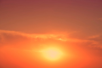 Background of sweet beautiful colorful red purple orange yellow sky with bright sun come out from the clouds, Bahrain