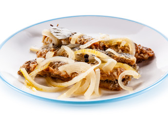 Marinated herrings on white background