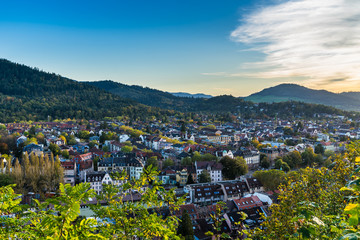 Germany, Aerial view above freiburg im breisgau city skyline with houses, church and streets...