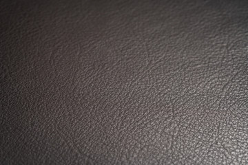 Closeup shot of full garin dark brown full grain leather