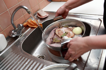 Person cooking of russian meat aspic