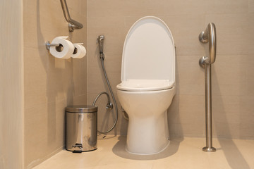 White toilet bowl and seat decoration in bathroom