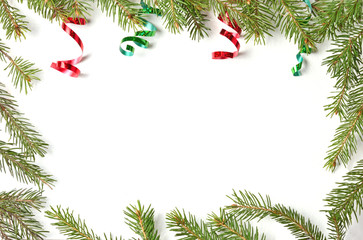 Obraz na płótnie Canvas Christmas balls and branches on a light background