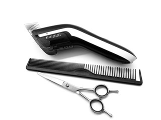 Hair clipper, scissors and comb isolated on white background. Set of hairdressing tools. Set for hair cutting. Composition of professional tools for a beauty salon.