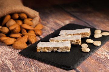 three pieces of almond nougat